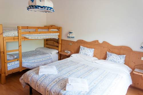 Imagen de la habitación del Hotel Albergo Vezzana. Foto 16