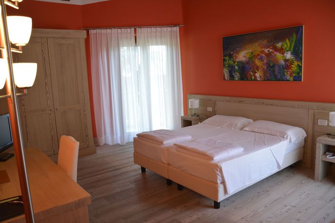 Imagen de la habitación del Hotel Albergo Vinnaeria La Baita. Foto 6