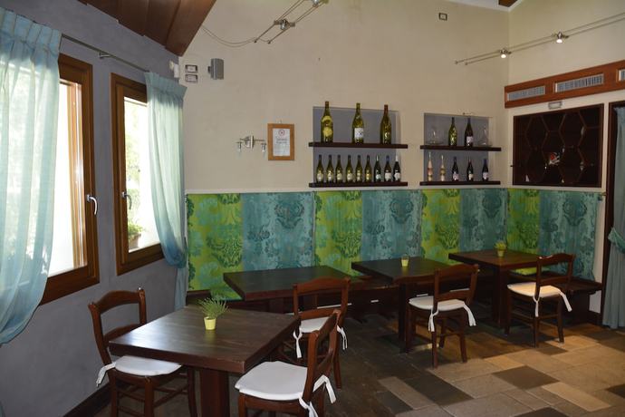 Imagen del bar/restaurante del Hotel Albergo Vinnaeria La Baita. Foto 5