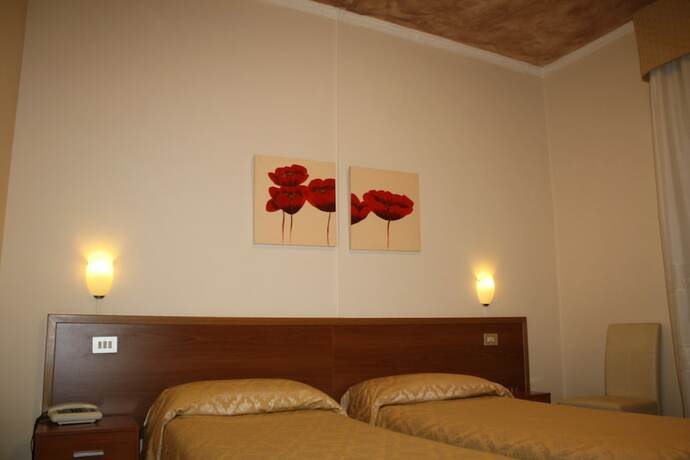 Imagen de la habitación del Hotel Albergo il Giglio, Prato. Foto 13