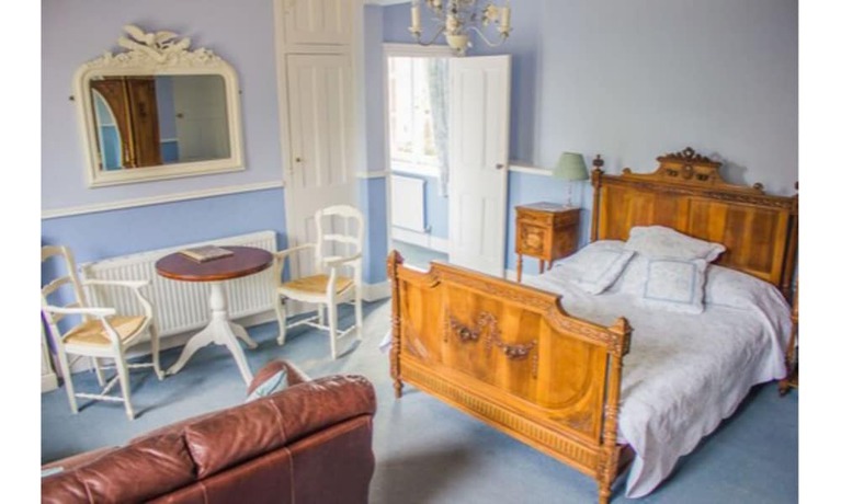 Imagen de la habitación del Hotel Albert Cottage. Foto 9