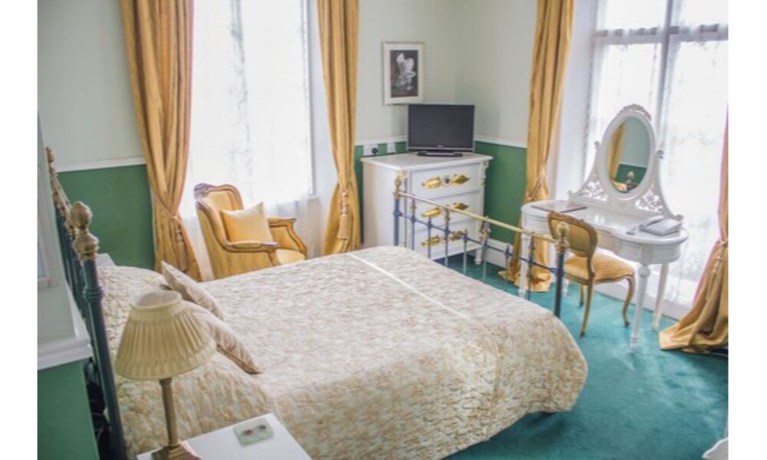 Imagen de la habitación del Hotel Albert Cottage. Foto 11