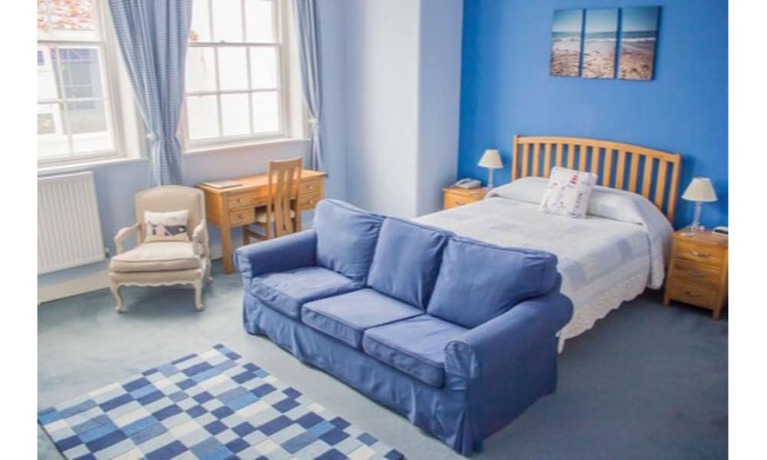 Imagen de la habitación del Hotel Albert Cottage. Foto 17