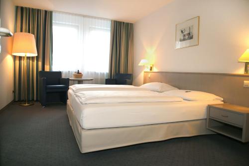 Imagen de la habitación del Hotel Albhotel Fortuna. Foto 3