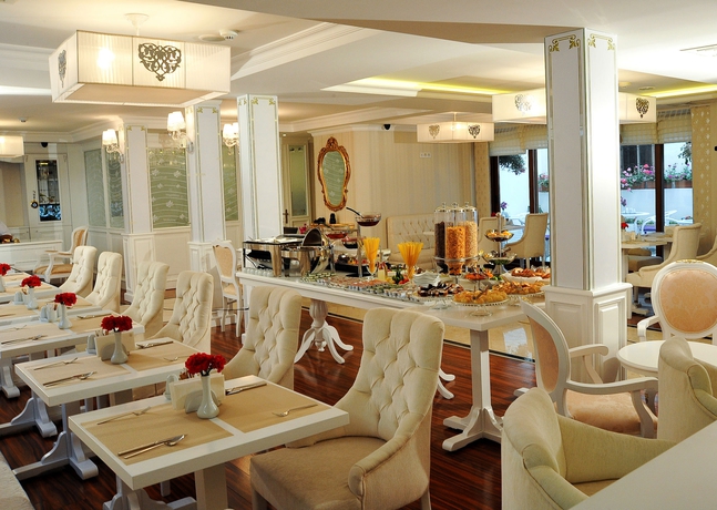 Imagen del bar/restaurante del Hotel Albinas Old City. Foto 4