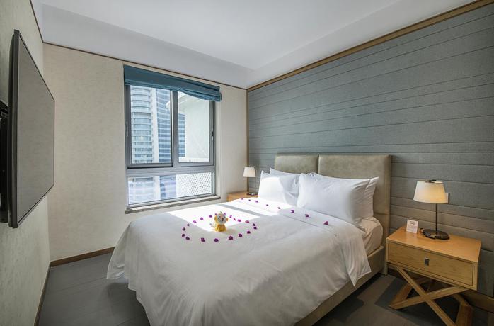 Imagen de la habitación del Hotel Albion Residence Haitang Bay Sanya. Foto 2