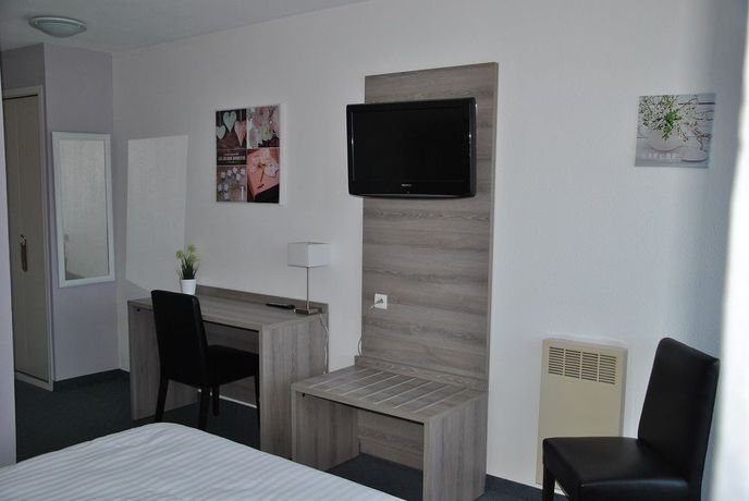 Imagen de la habitación del Hotel Albizzia. Foto 7