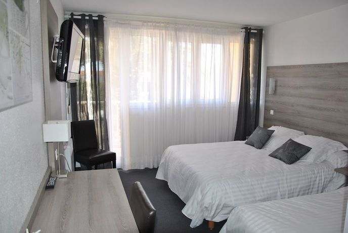 Imagen de la habitación del Hotel Albizzia. Foto 10