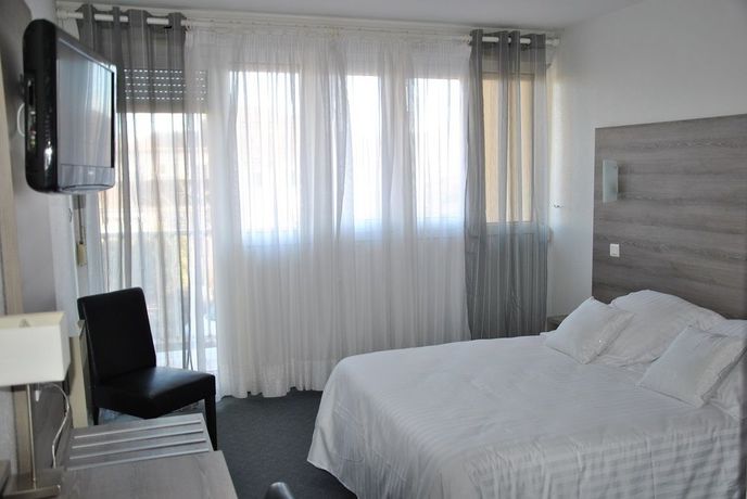 Imagen de la habitación del Hotel Albizzia. Foto 11