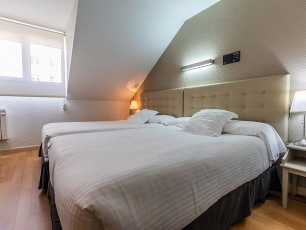 Imagen de la habitación del Hotel Alda Don Carlos. Foto 13