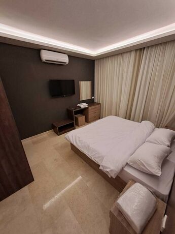 Imagen de la habitación del Hotel Aldora Residence suites. Foto 15