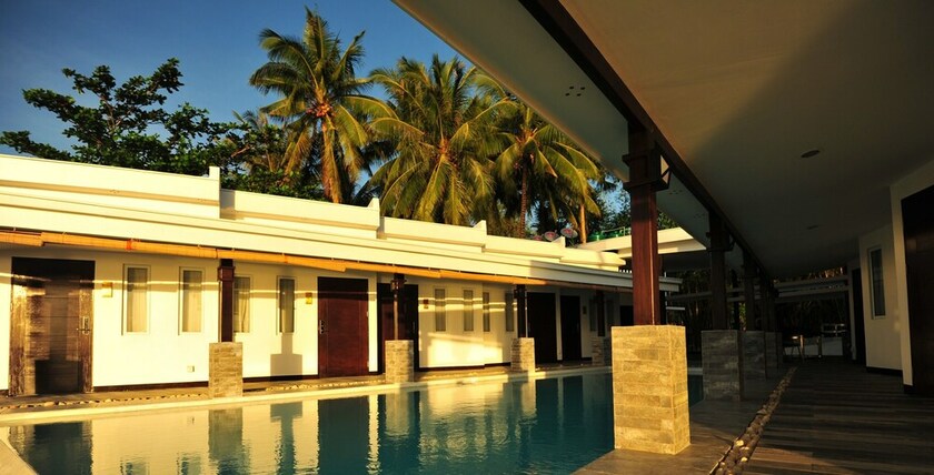 Imagen de la habitación del Hotel Alegria Water Front Beach House. Foto 11