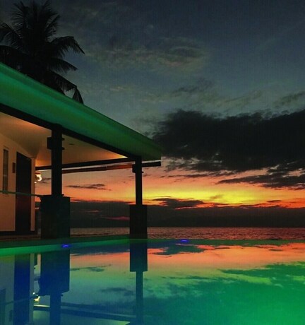 Imagen de la habitación del Hotel Alegria Water Front Beach House. Foto 12