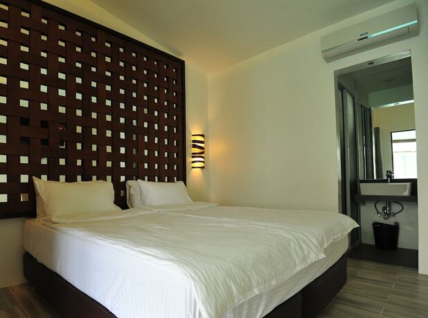 Imagen de la habitación del Hotel Alegria Water Front Beach House. Foto 15