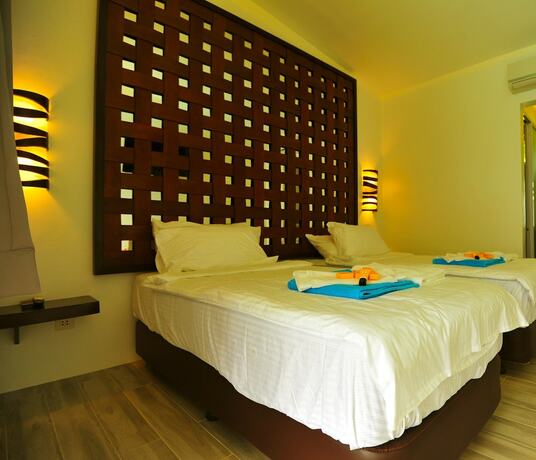Imagen de la habitación del Hotel Alegria Water Front Beach House. Foto 16