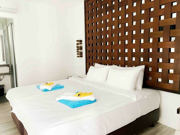 Imagen de la habitación del Hotel Alegria Water Front Beach House. Foto 19