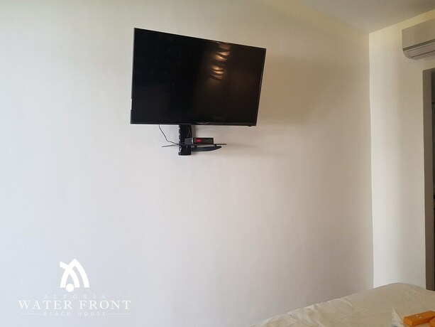 Imagen de la habitación del Hotel Alegria Water Front Beach House. Foto 24