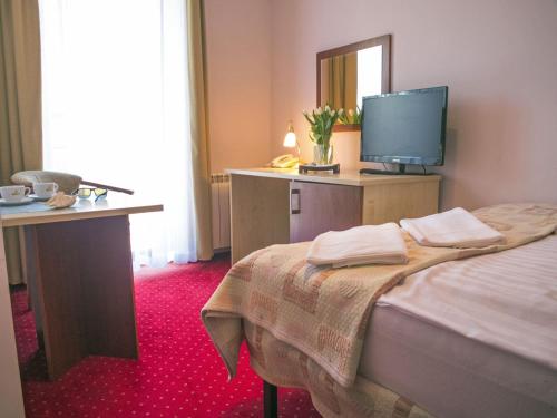 Imagen de la habitación del Hotel Aleksander. Foto 5