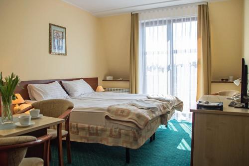 Imagen de la habitación del Hotel Aleksander. Foto 8