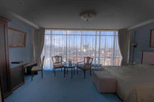 Imagen de la habitación del Hotel Aleksandrovskiy Grand. Foto 6