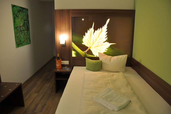 Imagen de la habitación del Hotel Alembra - Wein Style. Foto 17