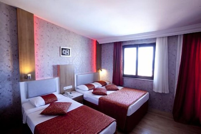 Imagen de la habitación del Hotel Aleria Belport Beach. Foto 7