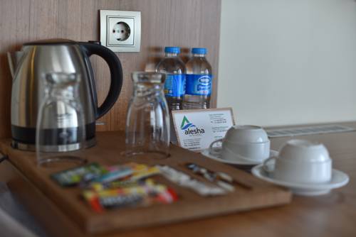 Imagen de la habitación del Hotel Alesha Suite. Foto 5