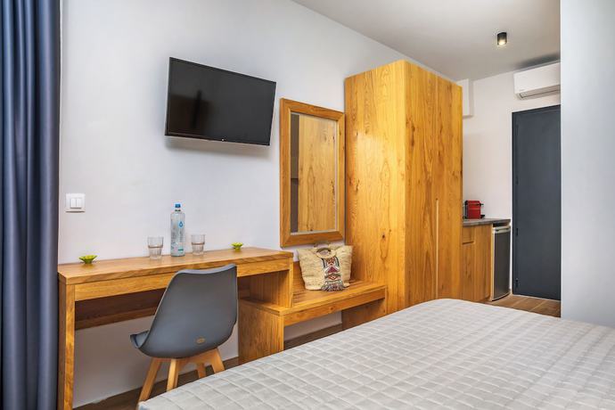 Imagen de la habitación del Hotel AlexMare Fourka. Foto 1