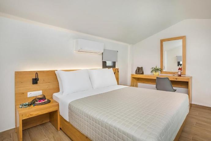 Imagen de la habitación del Hotel AlexMare Fourka. Foto 4