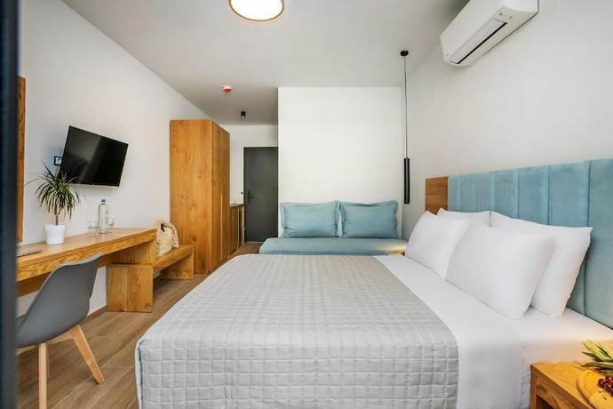 Imagen de la habitación del Hotel AlexMare Fourka. Foto 12