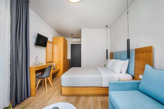 Imagen de la habitación del Hotel AlexMare Fourka. Foto 14