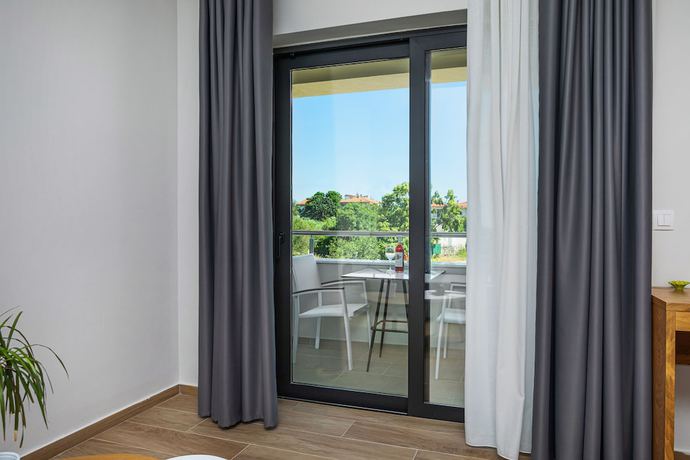 Imagen de la habitación del Hotel AlexMare Fourka. Foto 17