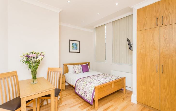 Imagen de la habitación del Hotel Alexander Apartments. Foto 5