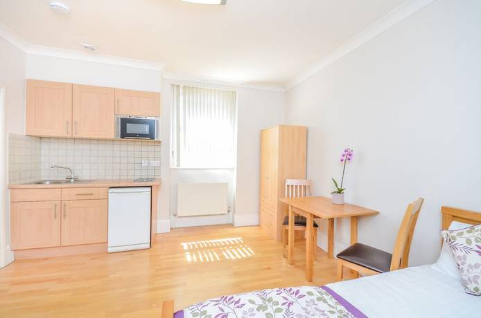 Imagen de la habitación del Hotel Alexander Apartments. Foto 17