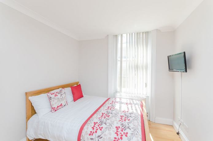 Imagen de la habitación del Hotel Alexander Apartments. Foto 19