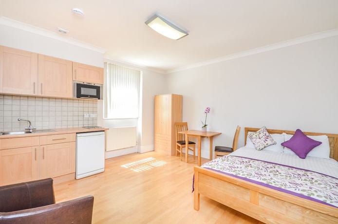 Imagen de la habitación del Hotel Alexander Apartments. Foto 20