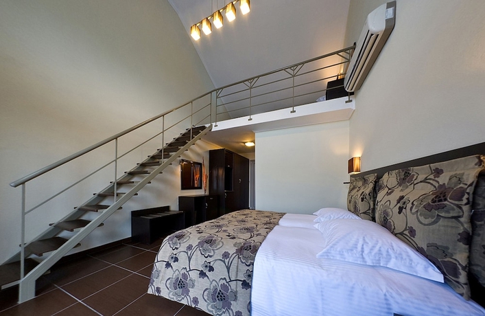 Imagen de la habitación del Hotel Alexander Inn, Stavros. Foto 5