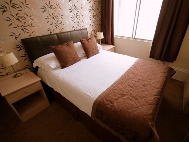Imagen de la habitación del Hotel Alexander's. Foto 14