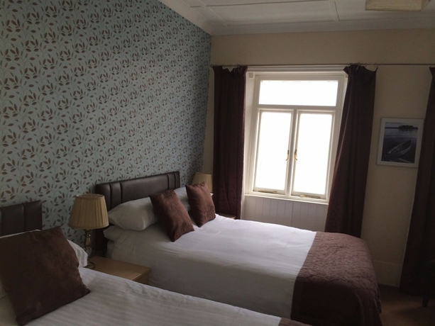 Imagen de la habitación del Hotel Alexander's. Foto 16