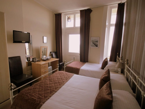 Imagen de la habitación del Hotel Alexander's. Foto 17