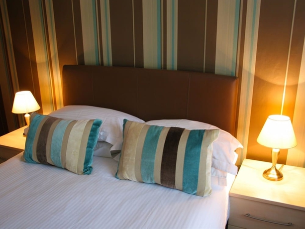 Imagen de la habitación del Hotel Alexander's. Foto 18