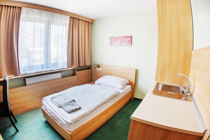 Imagen de la habitación del Hotel Alexandra Business. Foto 13