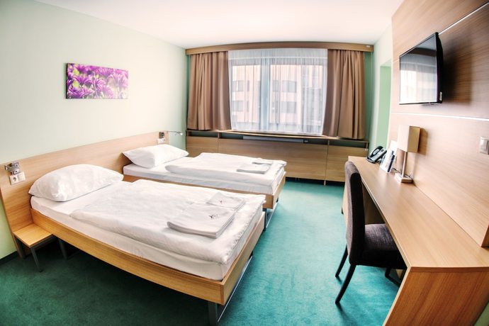 Imagen de la habitación del Hotel Alexandra Business. Foto 17