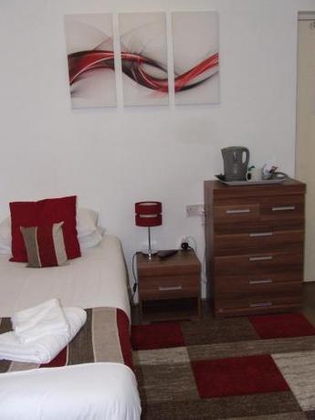 Imagen de la habitación del Hotel Alexandra Guest House. Foto 5