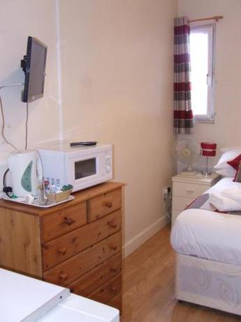 Imagen de la habitación del Hotel Alexandra Guest House. Foto 6