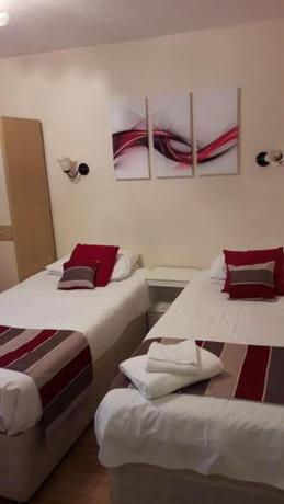 Imagen de la habitación del Hotel Alexandra Guest House. Foto 7