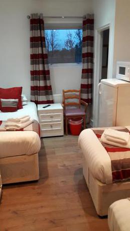 Imagen de la habitación del Hotel Alexandra Guest House. Foto 9