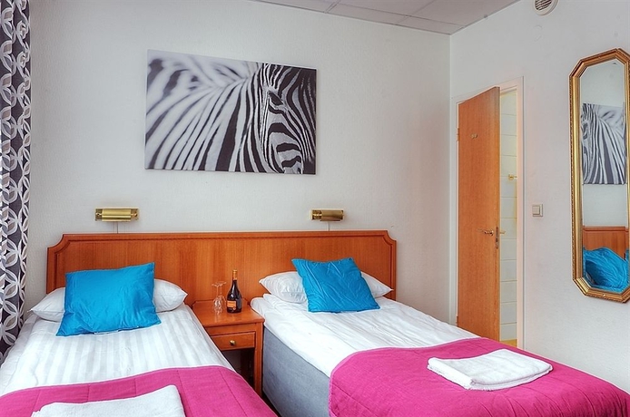 Imagen de la habitación del Hotel Alexandra Hotel. Foto 5