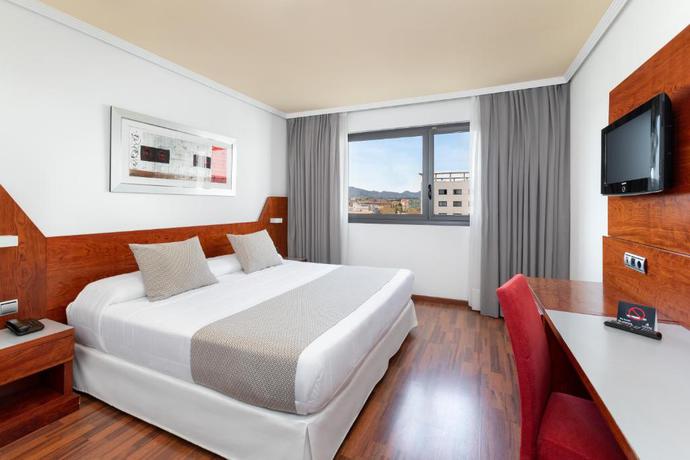 Imagen de la habitación del Hotel Alexandre Frontair Congress. Foto 7