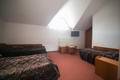 Imagen de la habitación del Hotel Alexandros Busteni by Genco & Restaurant Miorita. Foto 20
